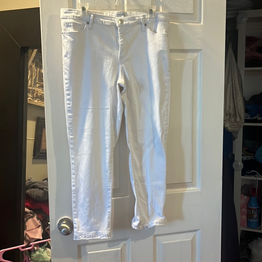 Wore one time. Super cute, Sean down back and ruffled bottom.